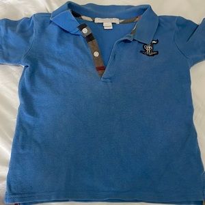 Burberry tiny stain can barely see it and tiny hole look at pictures closely